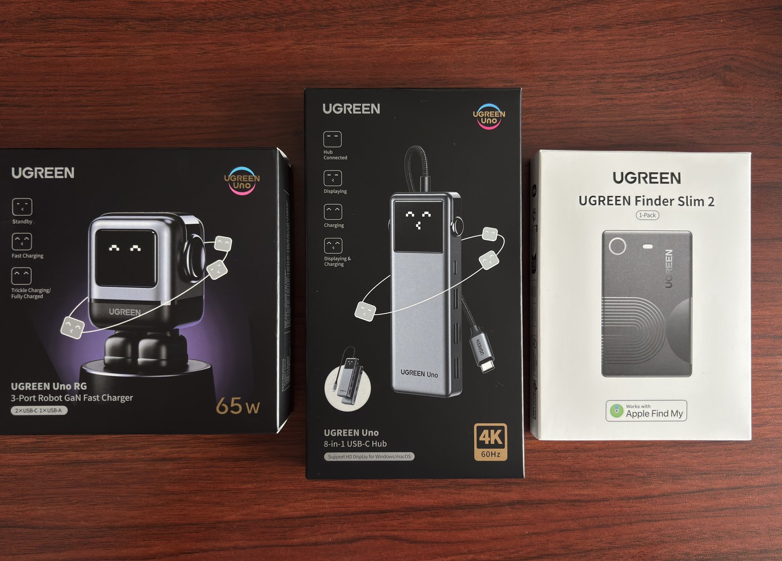 UGREENの65W充電器、8-in-1 USB-Cハブ、Finder Slim 2の3製品の箱を並べたカット
